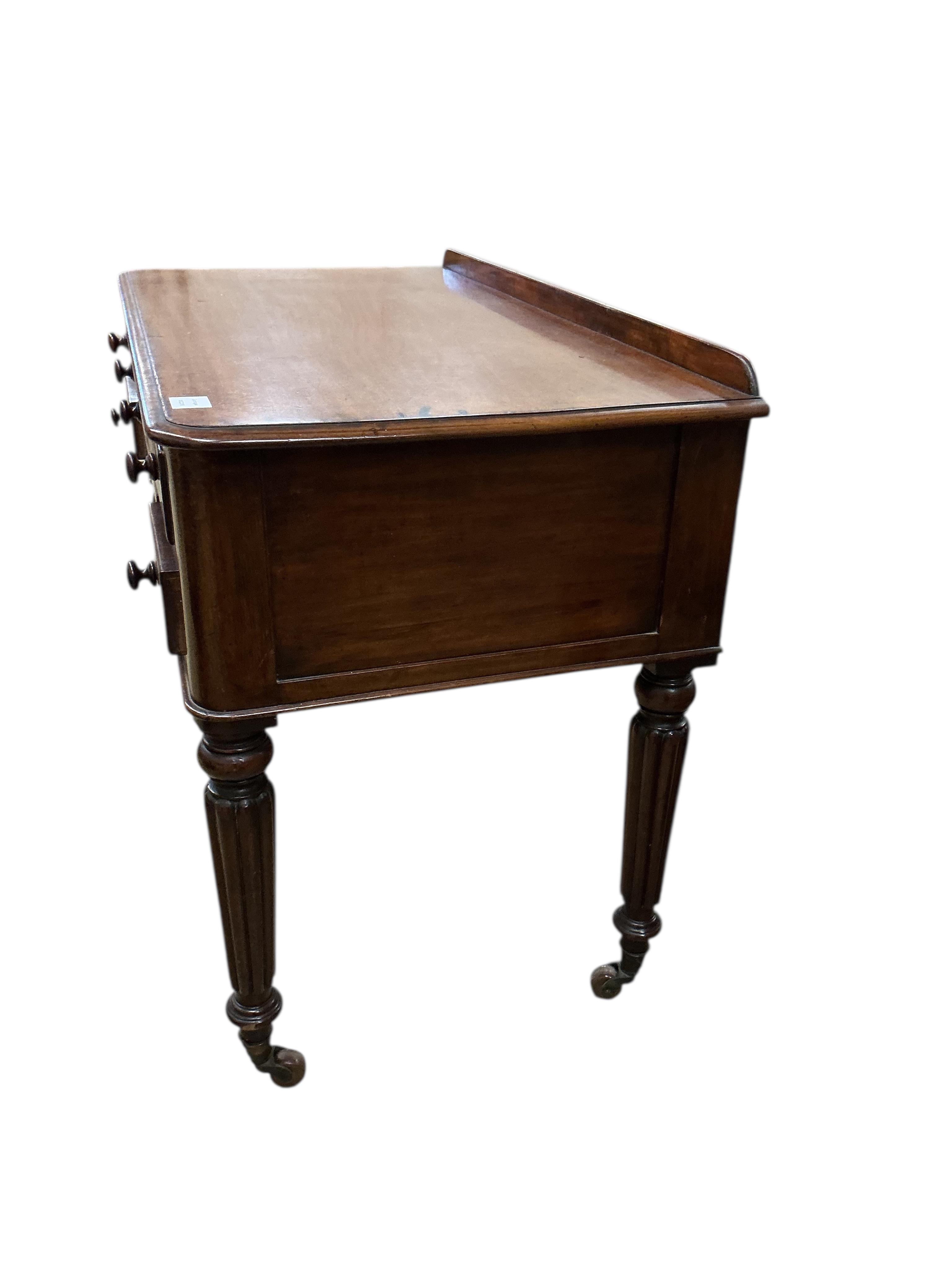 A Victorian mahogany kneehole dressing table, width 104cm, depth 54cm, height 79cm